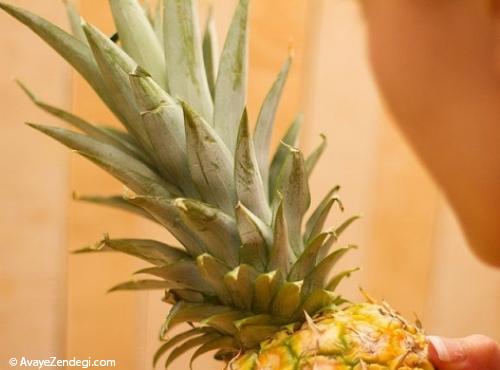 آموزش تصویری پوست کندن آناناس به شیوه ساده