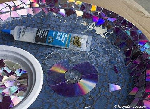 تزئین وسایل قدیمی با تکه های شکسته DVD 